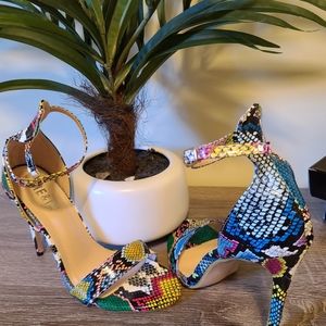 Never worn multi color snakeskin shoes